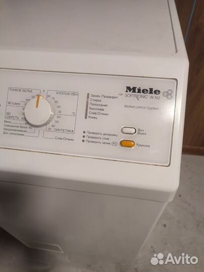 Стиральная машина с вертикальной загрузкой Miele