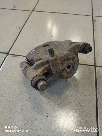 Суппорт тормозной передний левый Kia Picanto 2