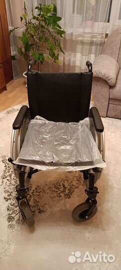 Новая инвалидная коляска