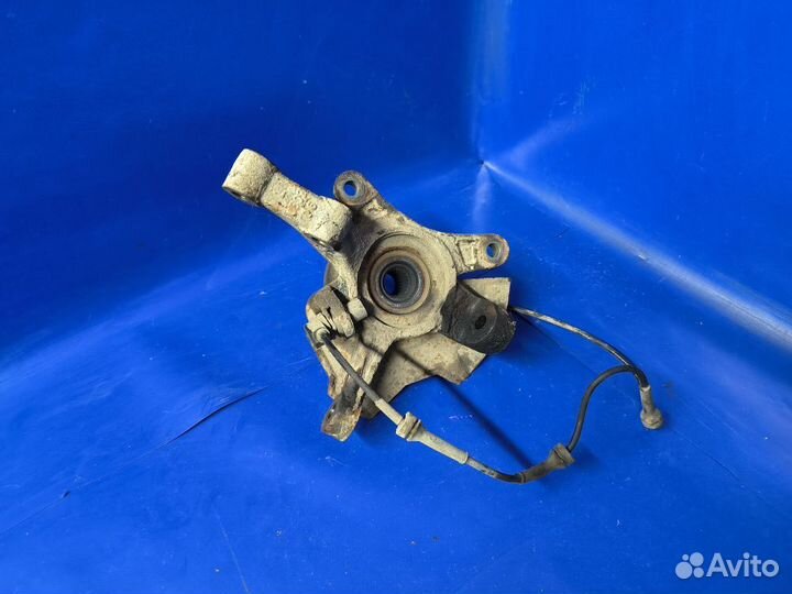 Кулак передний левый Chevrolet Aveo 255