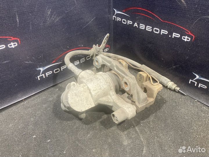 Суппорт тормозной задний левый mazda 3 bk