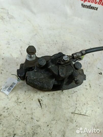 Суппорт тормозной передний левый Volkswagen Golf