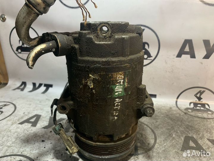 Компрессор кондиционера Опель Астра