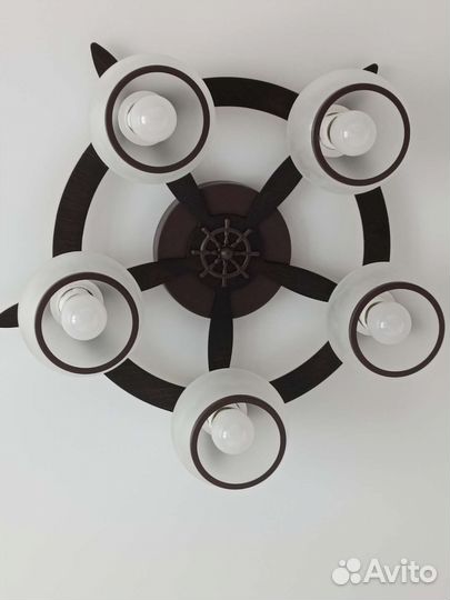 Люстра штурвал в морском стиле