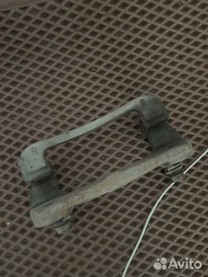 Скоба суппорта toyota corolla е150