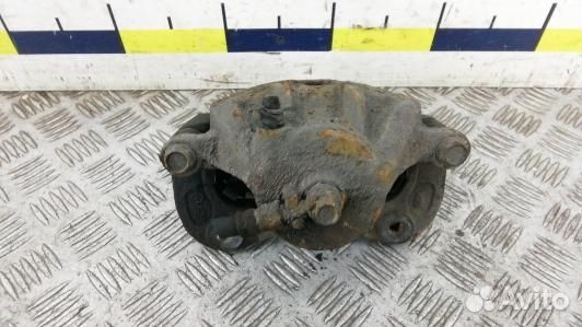 Суппорт тормозной передний левый KIA sportage 2 (2