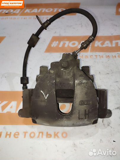 Суппорт тормозной передний левый Ford Focus 3 2011