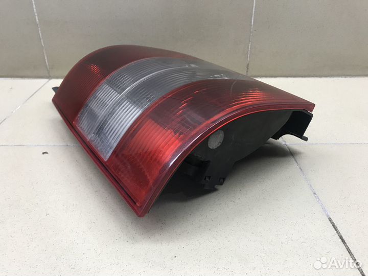 Фонарь задний наружный левый Transporter T5 2003-2