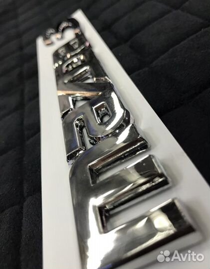 Шильдик на багажник Mazda 3