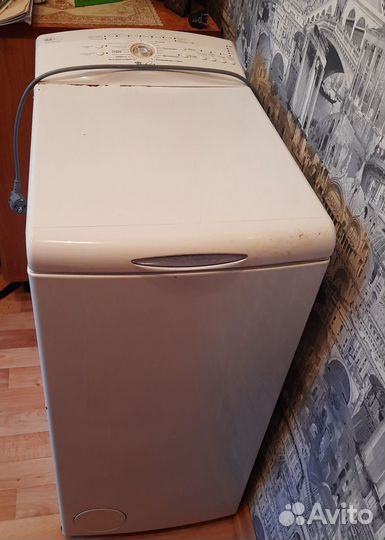 Стиральная машина с вертикальной загрузкой