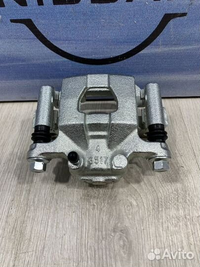 Суппорт тормозной задний Nissan qashqai J10 Прав