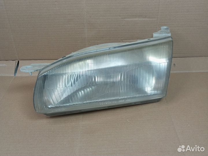 Фара левая 12-411 на Toyota Corolla AE110