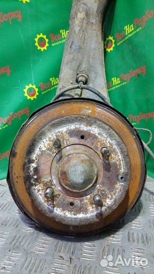 Кулак задний левый Mitsubishi Lancer 9 универсал