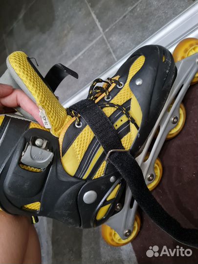 Роликовые коньки