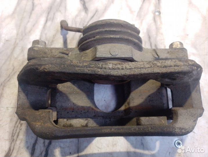 Суппорт тормозной передний правый Kia Sportage FE