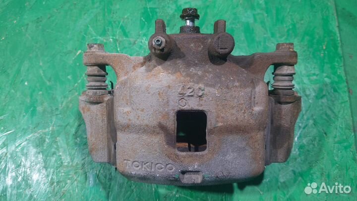 Суппорт передний L L200/4 mitsubishi L200 (2006-20