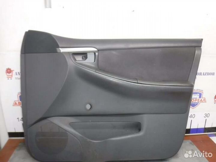 Обшивка двери передняя правая Toyota Corolla 124