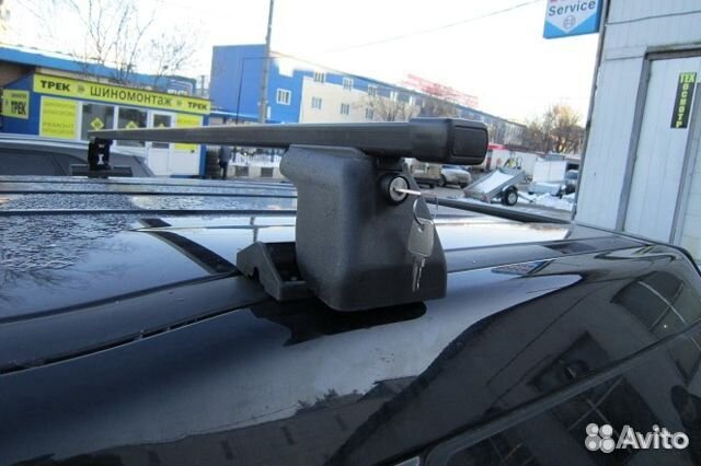 Универсальный багажник на крышу со штатными местам