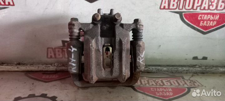 Суппорт тормозной задний левый Honda Cr-V RM4 K24A