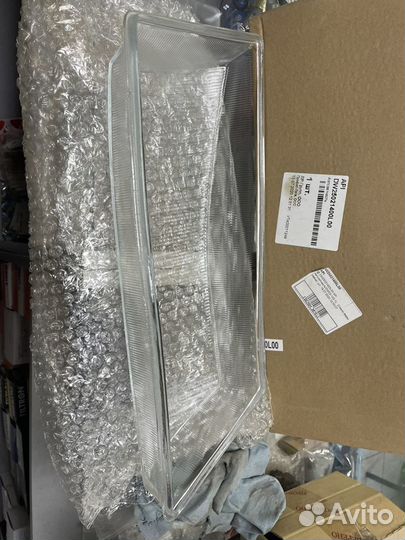 Стекло фары левое Daewo Nexia