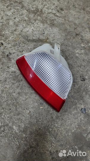 Фонарь противотуманный задний левый Ford Focus