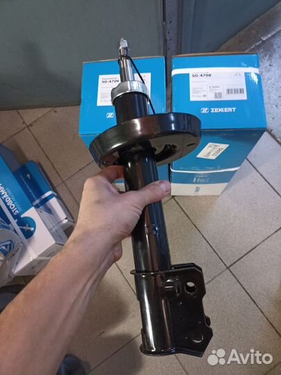 Амортизатор передний левый Opel Astra G