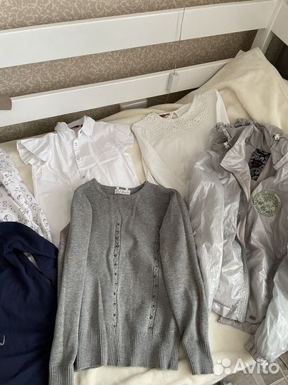 Два пакета вещей от 122 до 134 см