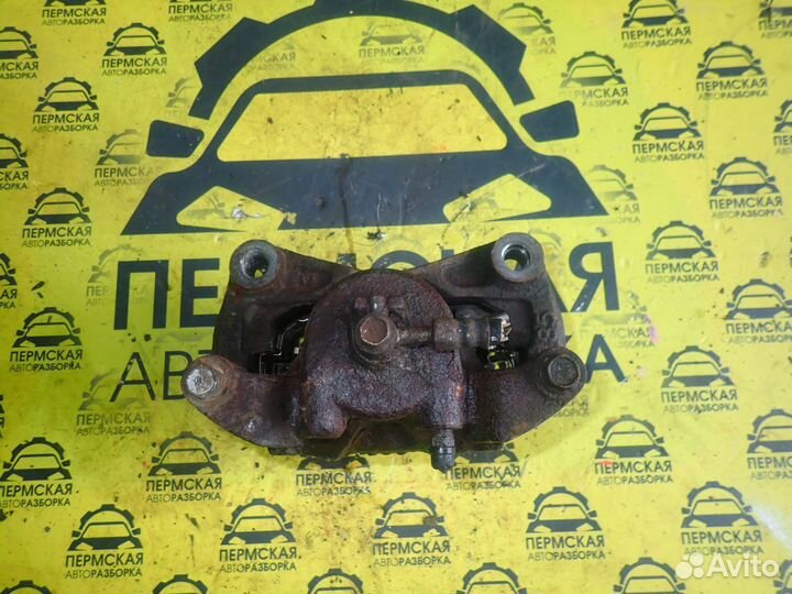 Суппорт передний левый Nissan Teana J32