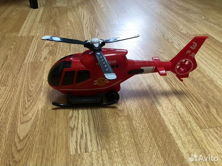 Детские машинки и вертолет игрушки