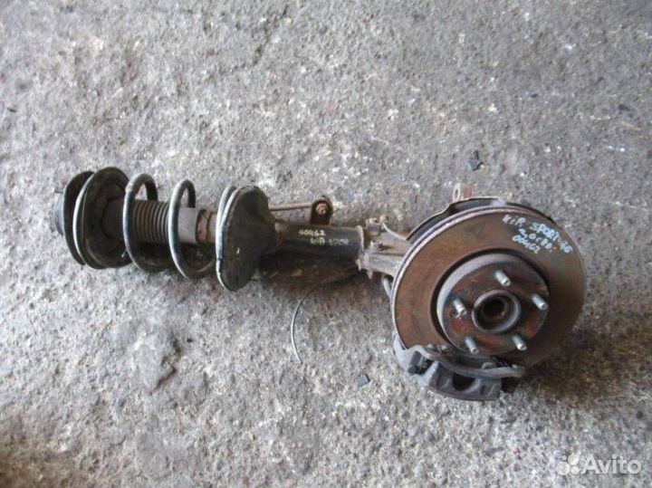 Стойка амортизатора передняя левая Kia Sportage 2