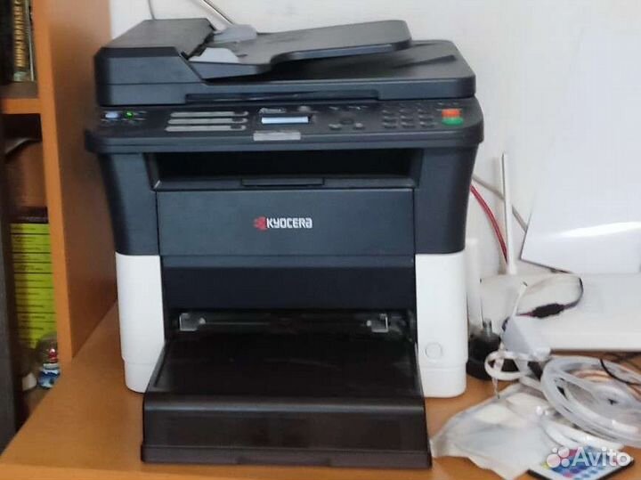 Мфу (принтер + сканер) Kyocera FS-1025MFP лазерный