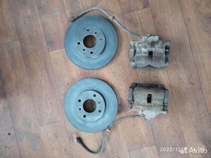 Nissan Almera N16 суппорта передние