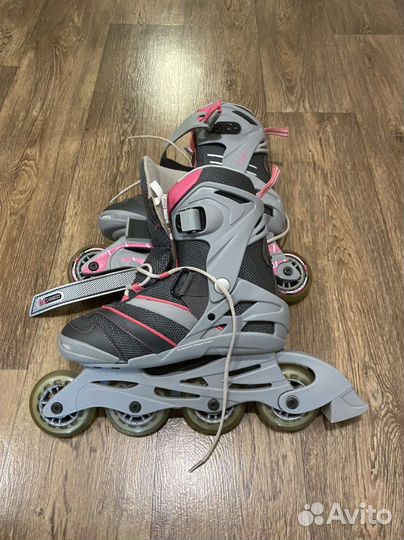 Роликовые коньки