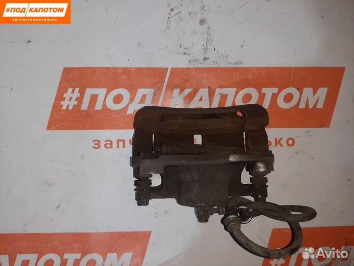 Суппорт тормозной передний левый Nissan X-Trail