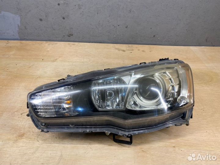 Фара Mitsubishi Lancer X CY левая