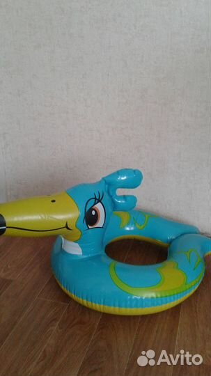 Надувной круг тукан