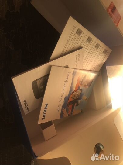 Отдам коробку от телефона Philips V387 Black
