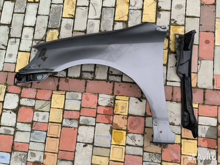 Toyota corolla 130 2003 USA крыло переднее левое