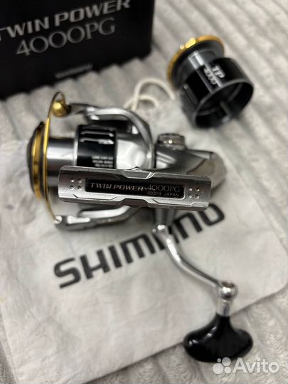 Катушка shimano 15 twin power 4000 pg