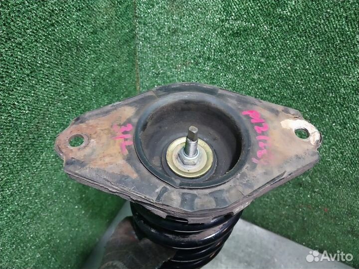 Амортизатор задний левый Nissan Primera P12 QG18