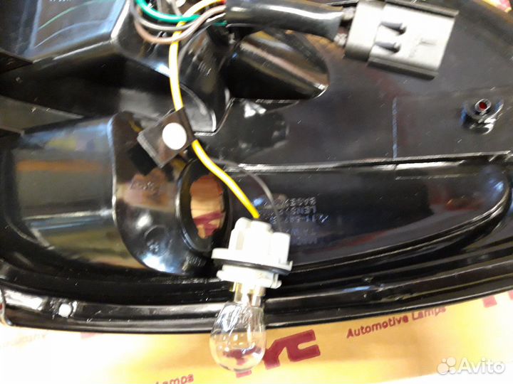 Задний фонарь Караван/Вояджер/Таун Кантри 01-03г