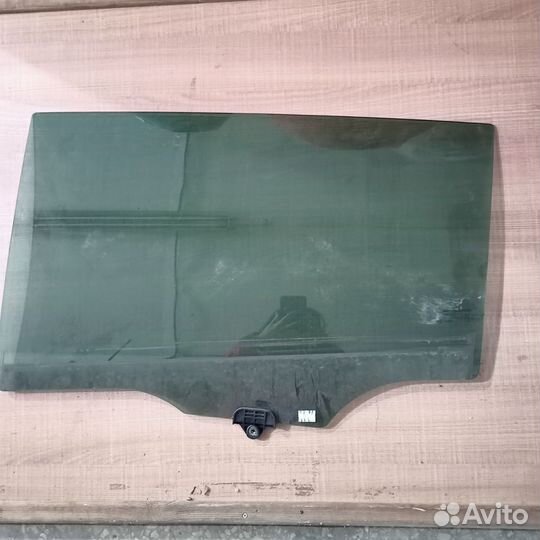 Стекло заднее левое Kia Sportage 3
