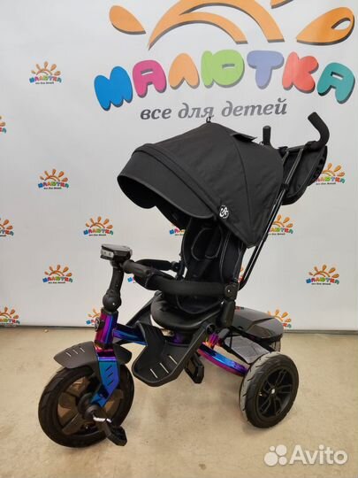 Трехколесный велосипед с поворотным сиденьем