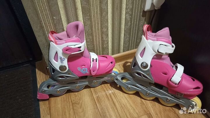 Роликовые коньки