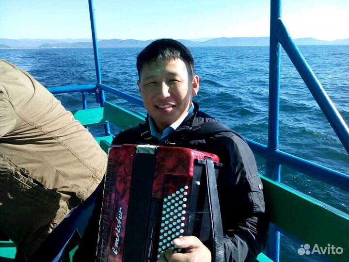 Музыкант аккордеонист на мероприятие