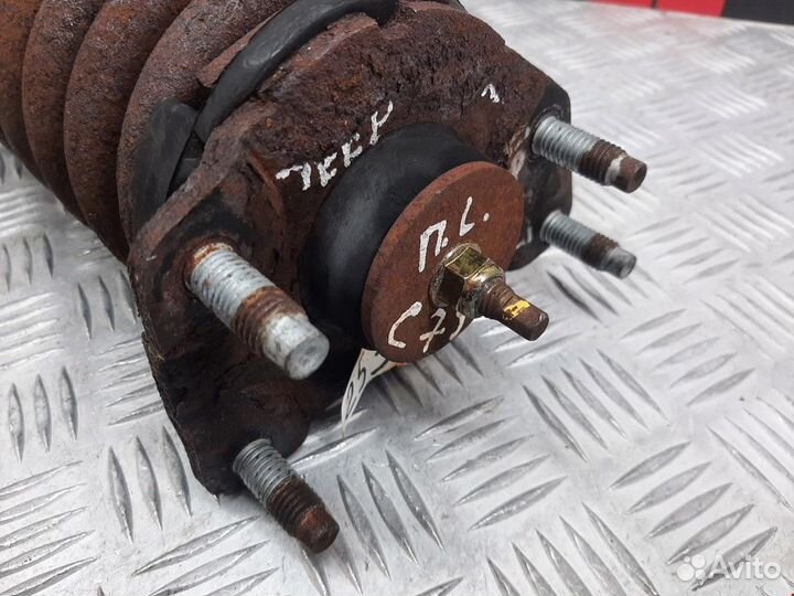 Стойка передняя левая Jeep Cherokee KJ 2002