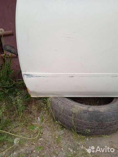 Дверь задняя левая Ниссан Блюберд EU14