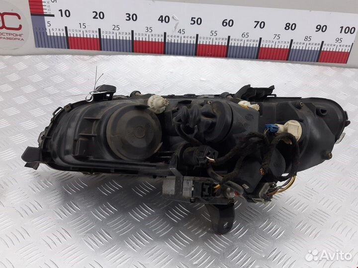 Фара передняя для Opel Omega B 9193418