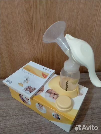 Молокоотсос medela ручной