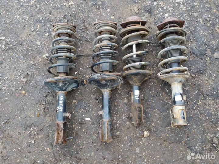 Стойки передние hyundai accent 2004 года